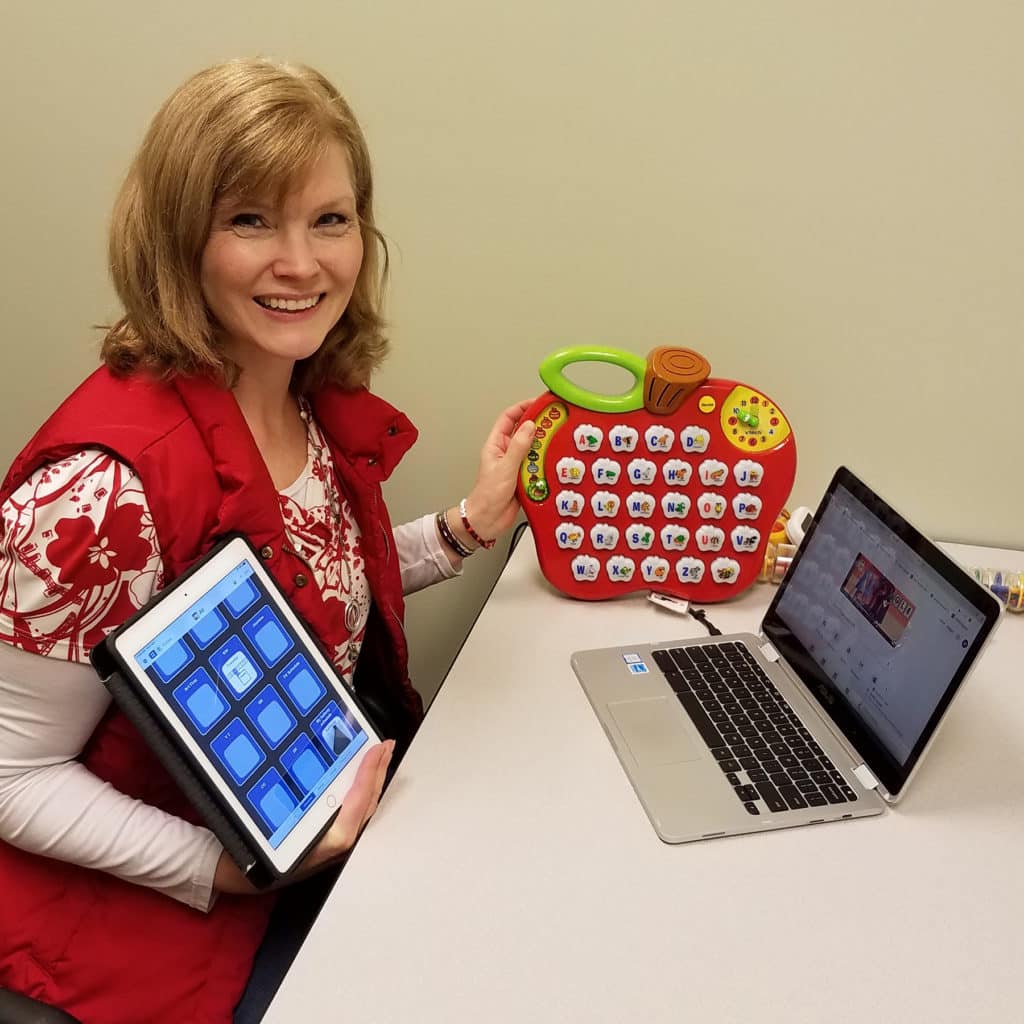 Melodie Ethel-King, OTR/L Using VTech ABC Learning Apple.